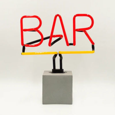 'Bar' Neon Sign On Concrete Base